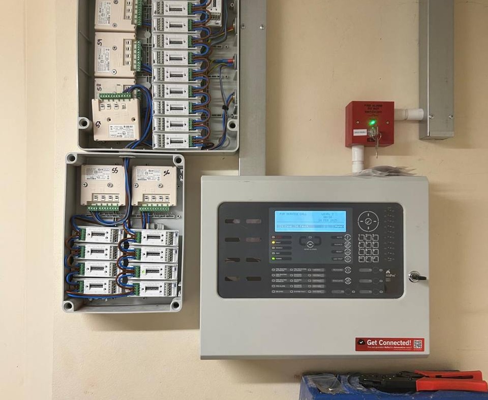 BAFE-accredited engineer servicing a domestic fire alarm system in Rugby