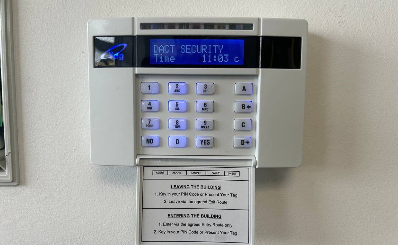 Existing UK intruder alarm panel during takeover and re-certification by DACT engineers